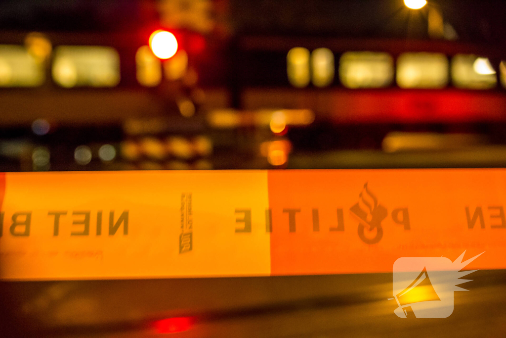Persoon met rolstoel op spoor