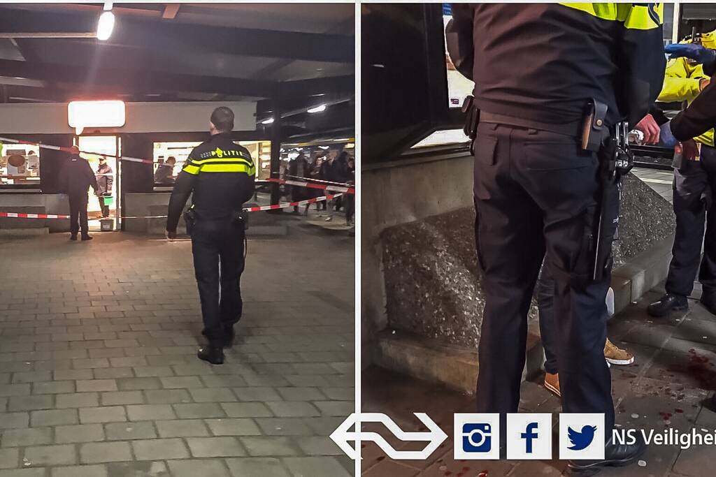 Man springt door Kiosk-ruit op NS-station