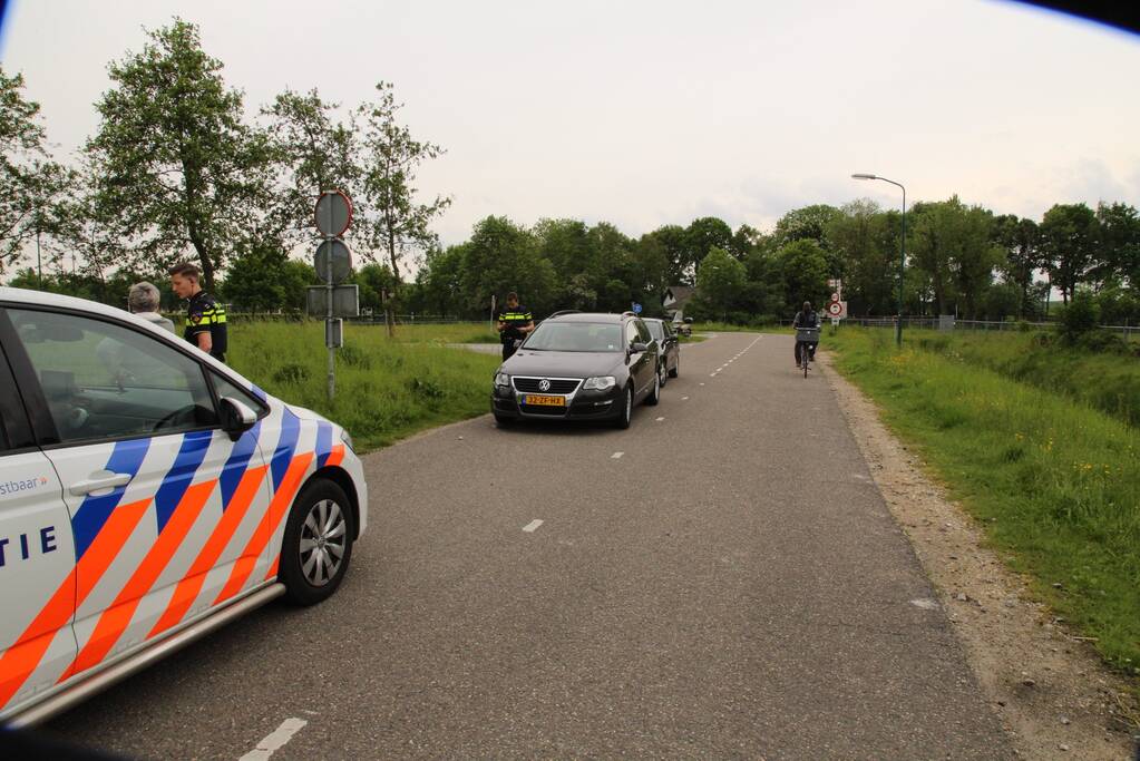 Schade bij botsing op rotonde