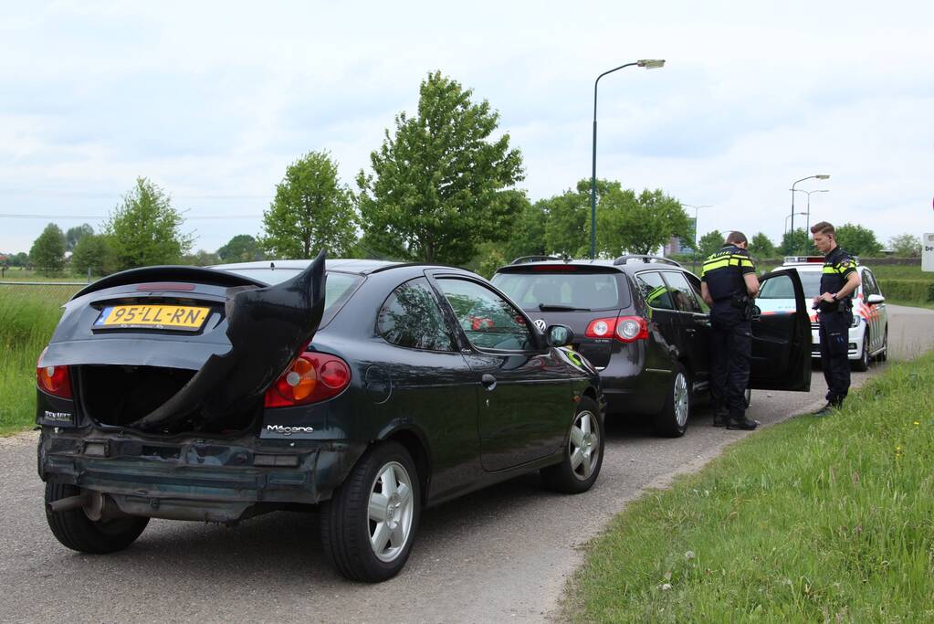 Schade bij botsing op rotonde
