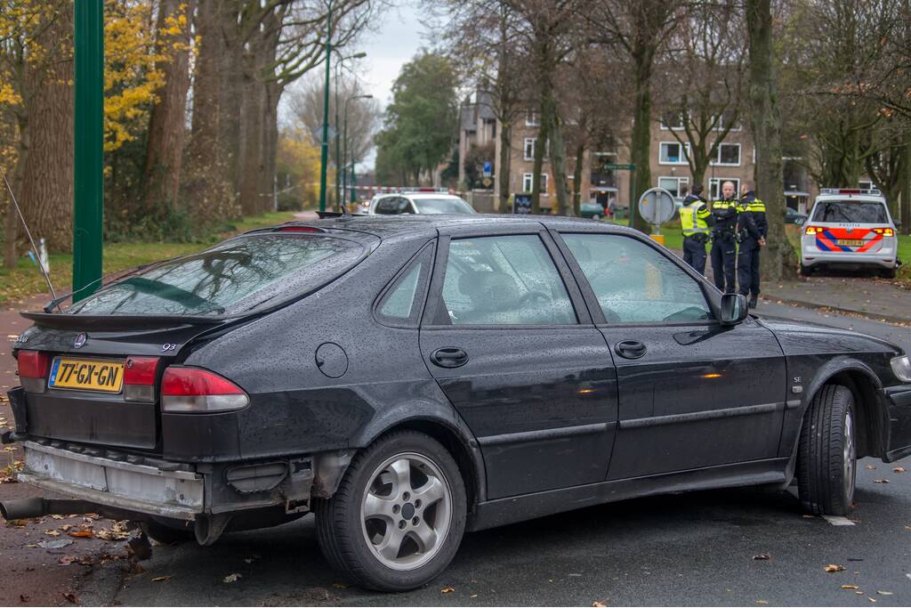 Politieauto in botsing met personenauto