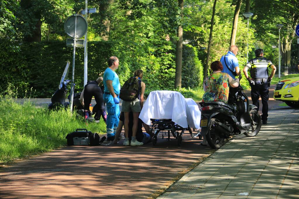 Brommerrijder gewond na botsing met fietser