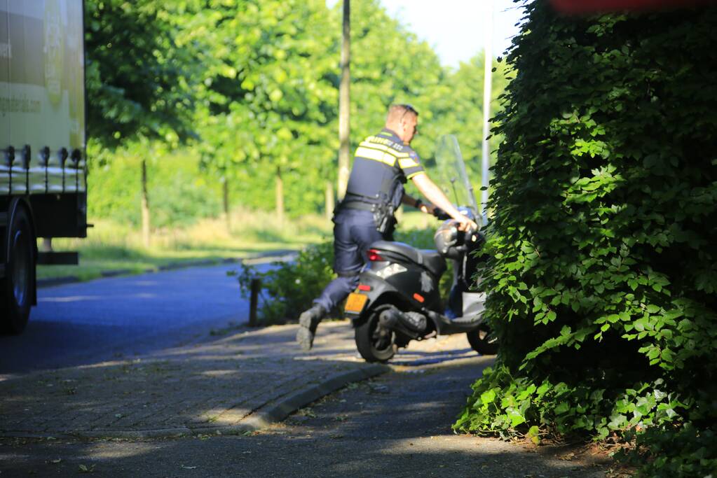 Brommerrijder gewond na botsing met fietser