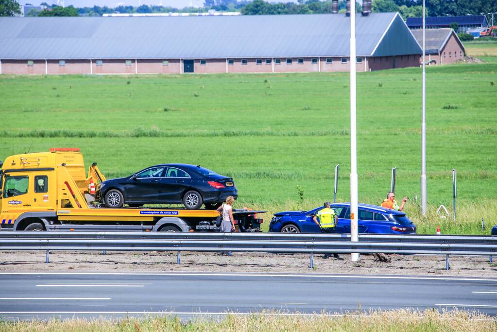 Bestuurder gewond na kop-staartbotsing