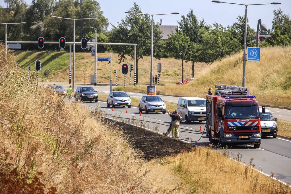Flinke bermbrand op dijk