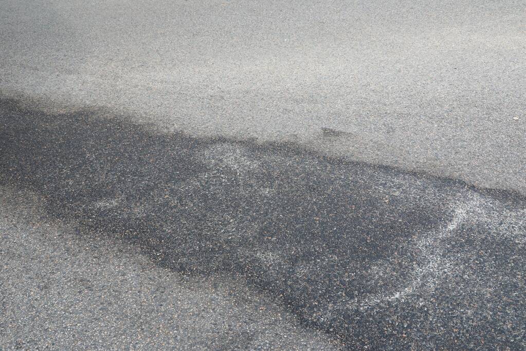 Verkeershinder door vervuilde weg