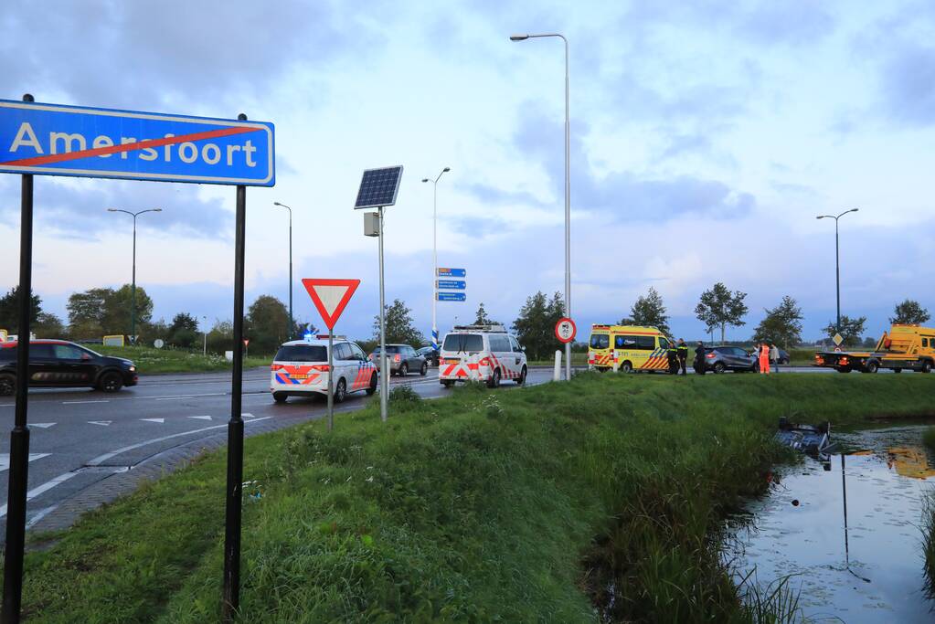 Auto te water na aanrijding