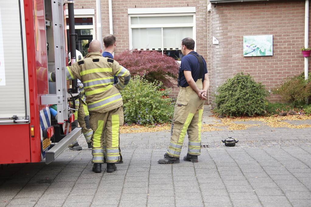 Rook door pannetje op het vuur