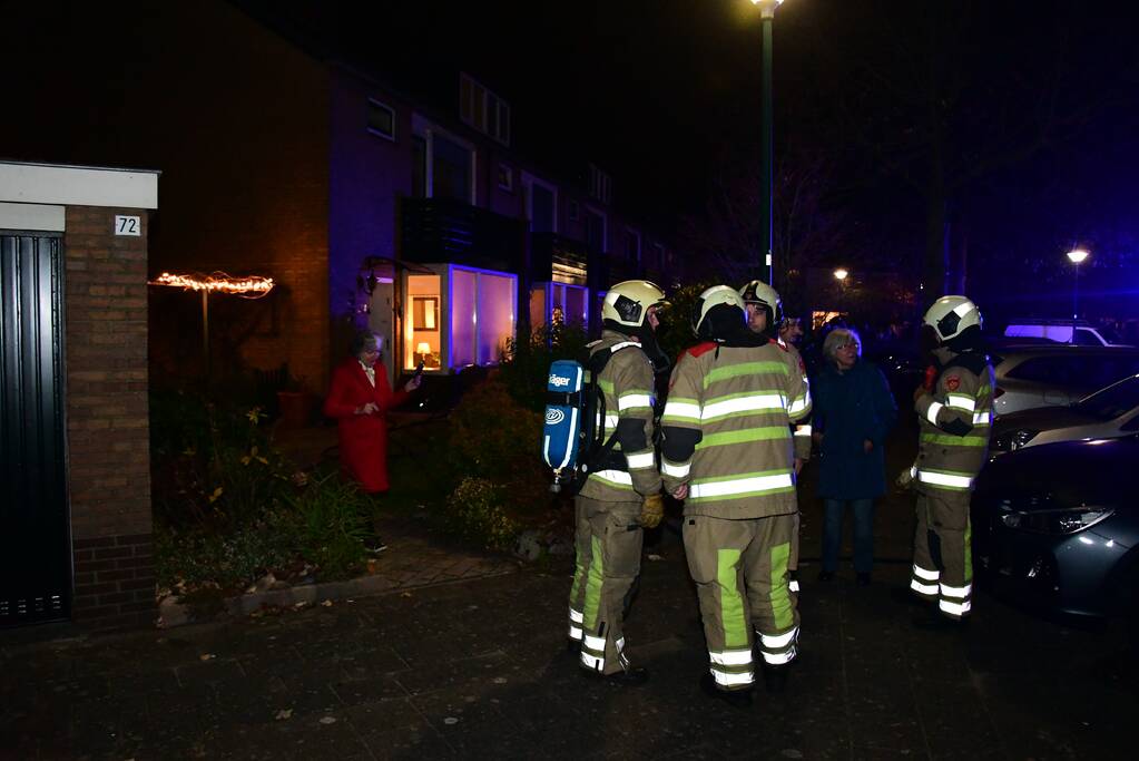 Woonkamer vol rook door schoorsteenbrand