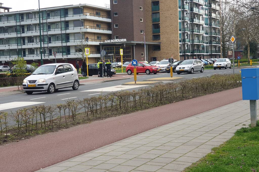 Automobilist ziet scootmobiel over het hoofd