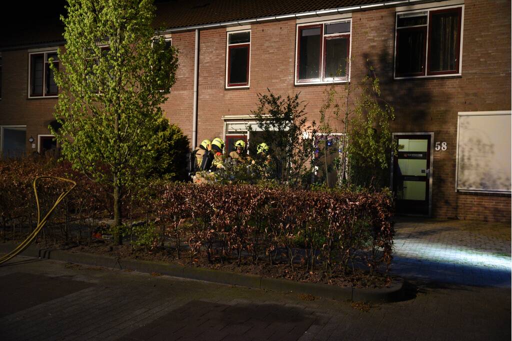 Woning vol rook door smeulende doeken