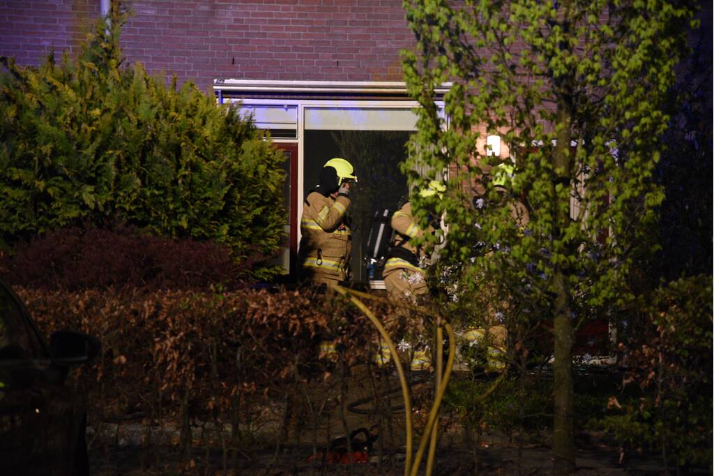 Woning vol rook door smeulende doeken
