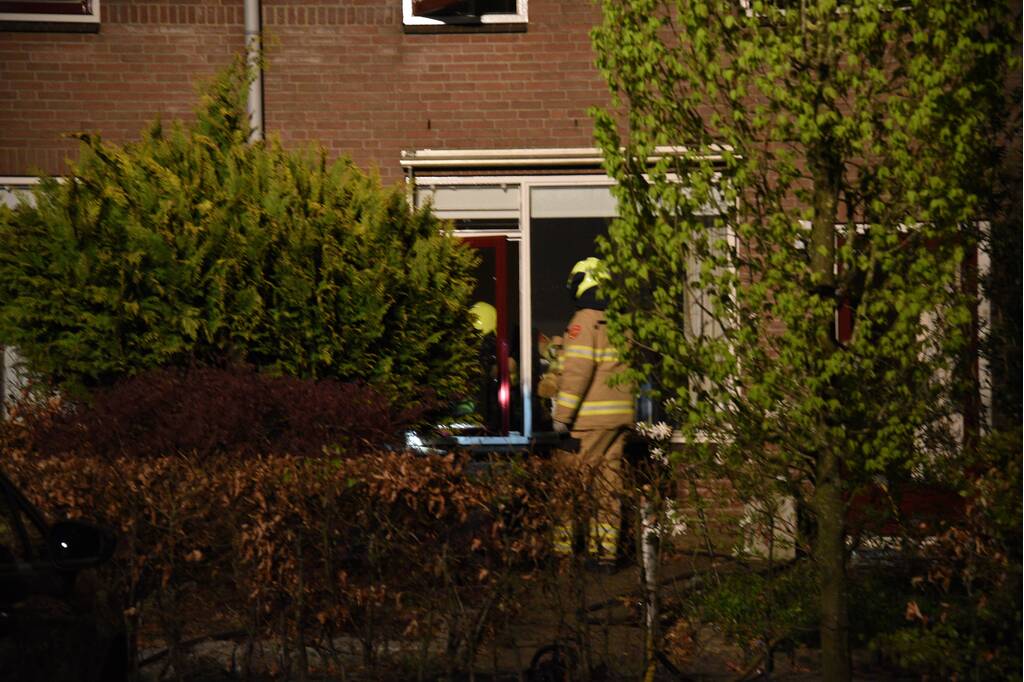 Woning vol rook door smeulende doeken