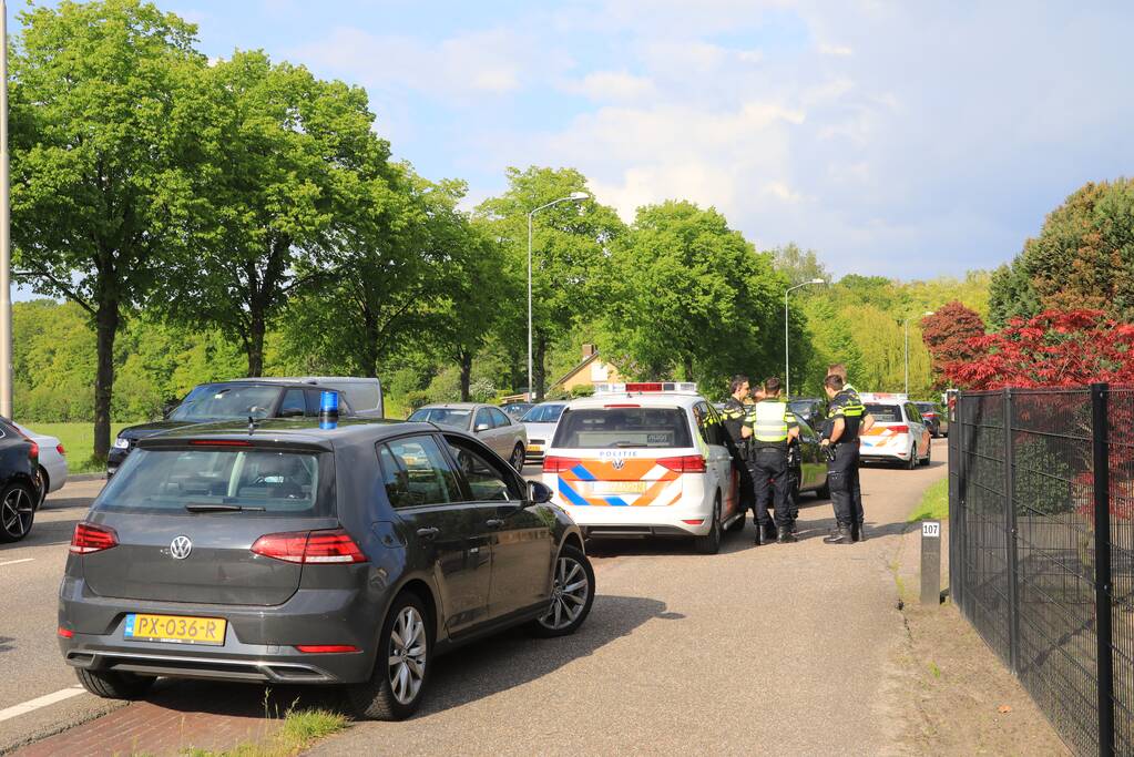 Politieauto botst op auto tijdens spoedrit