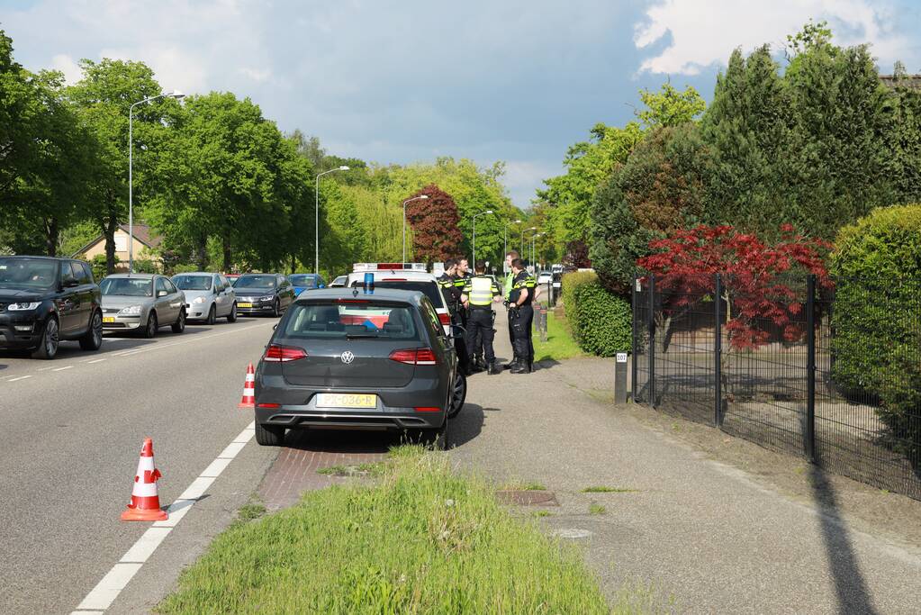 Politieauto botst op auto tijdens spoedrit