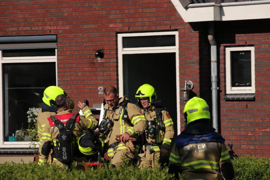Afzuigkap in brand door frituurpan