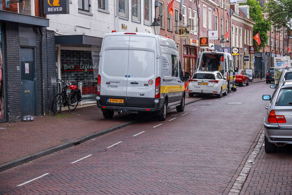 Opengebroken stoep door gaslek