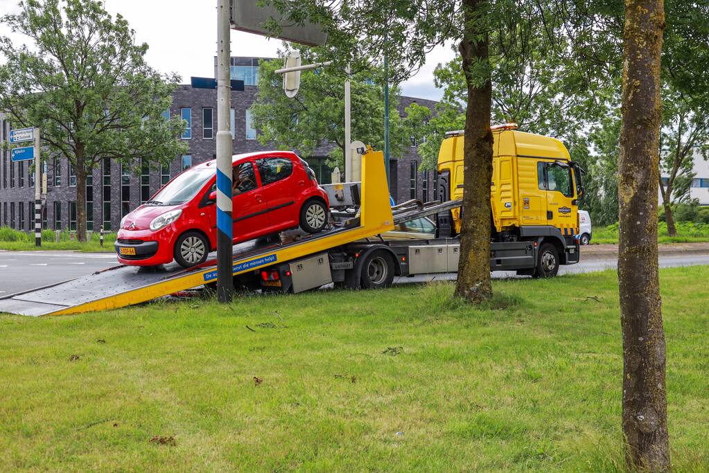 Schade na botsing op kruising