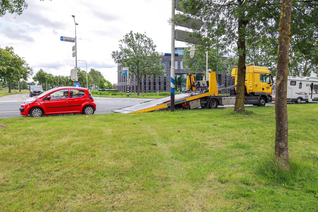 Schade na botsing op kruising