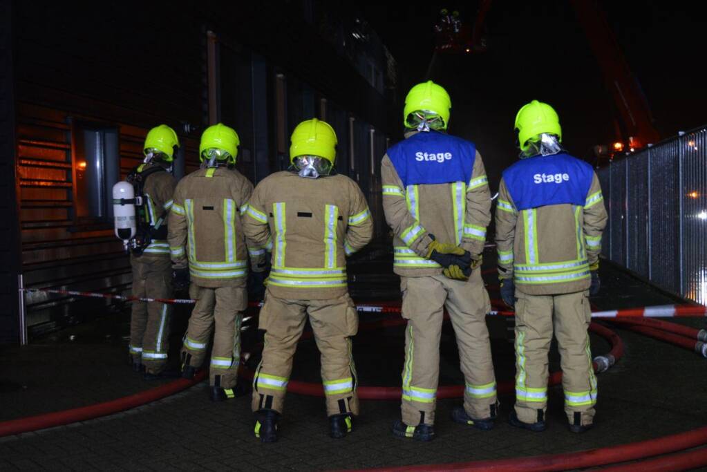 Negen woningen geÃ«vacueerd na brand in bedrijfspand