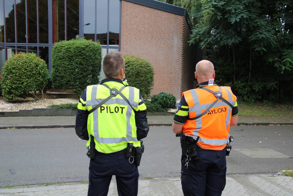 Fietsster botst tegen openstaande autoportier