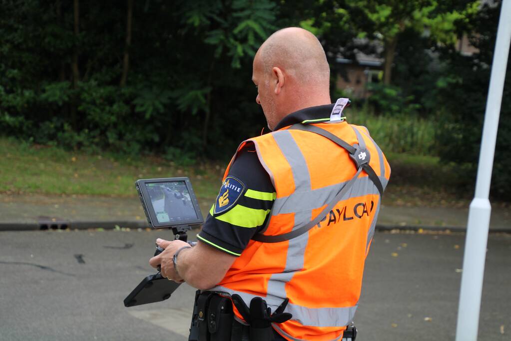 Fietsster botst tegen openstaande autoportier