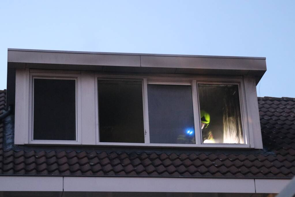 Veel rook bij woningbrand