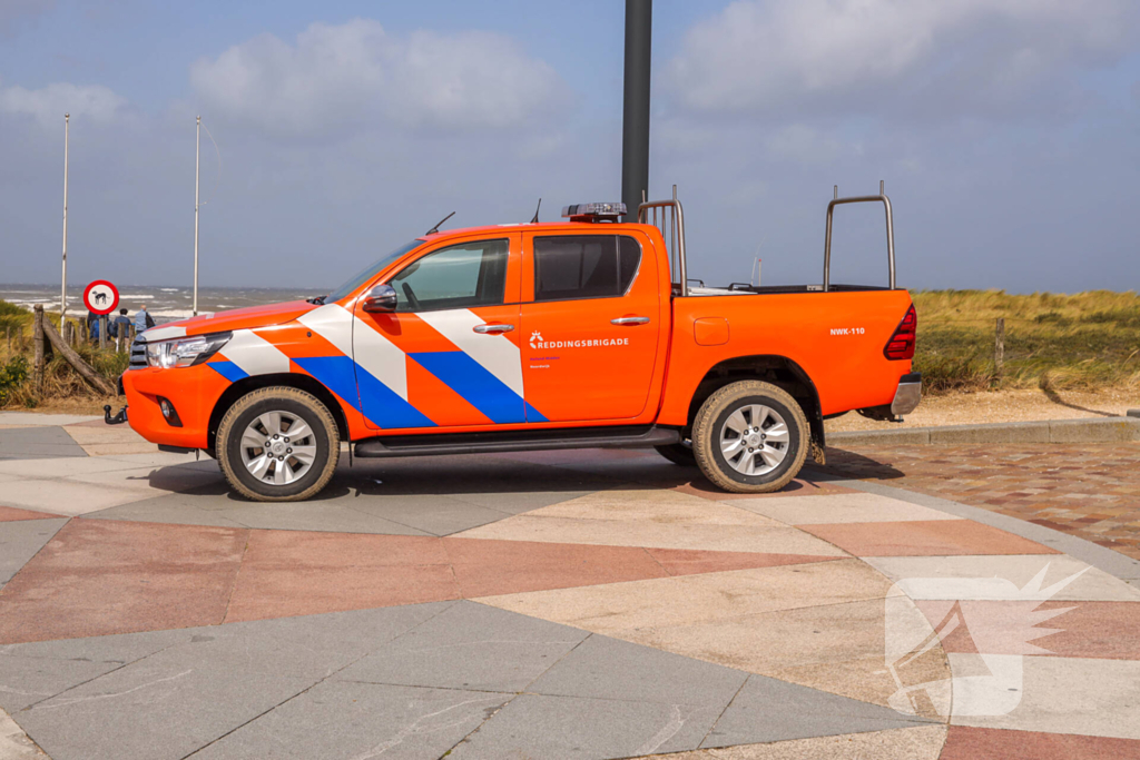 Persoon in problemen in zee