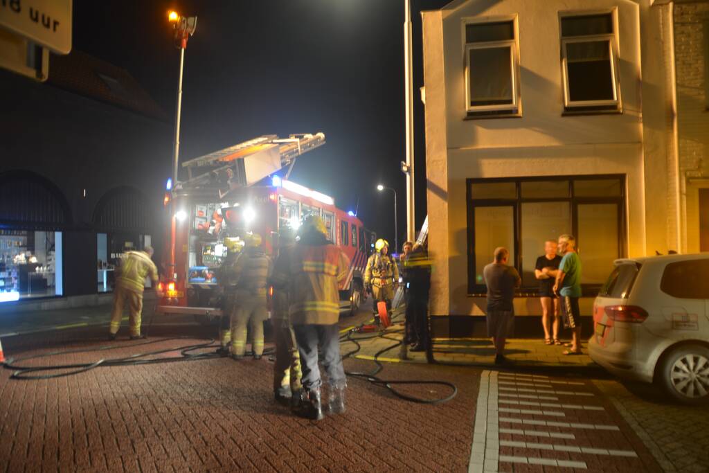 Oven vat vlam in woning