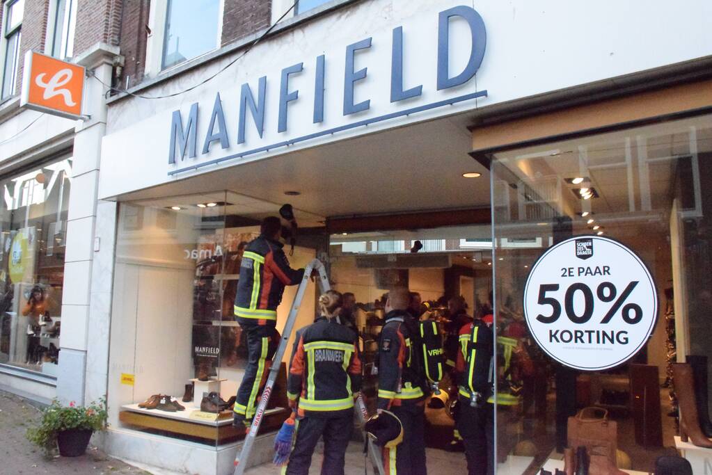 Brandlucht door smeulende transformator Manfield schoenenwinkel