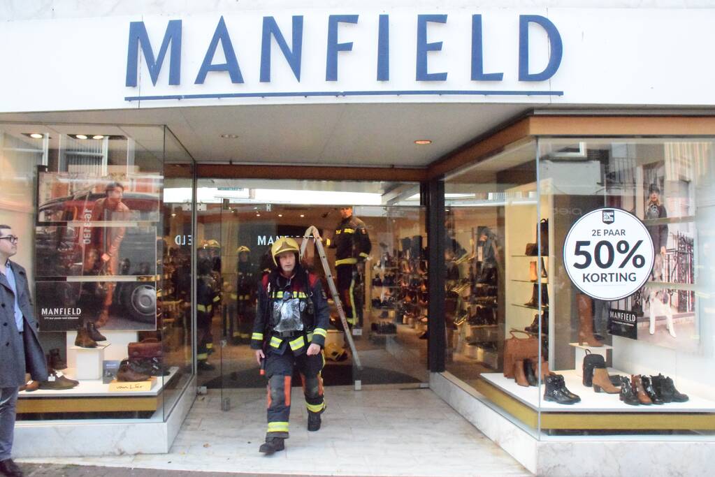 Brandlucht door smeulende transformator Manfield schoenenwinkel