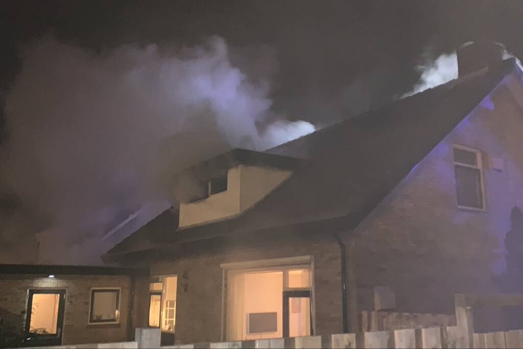 Slaapkamer woning in brand