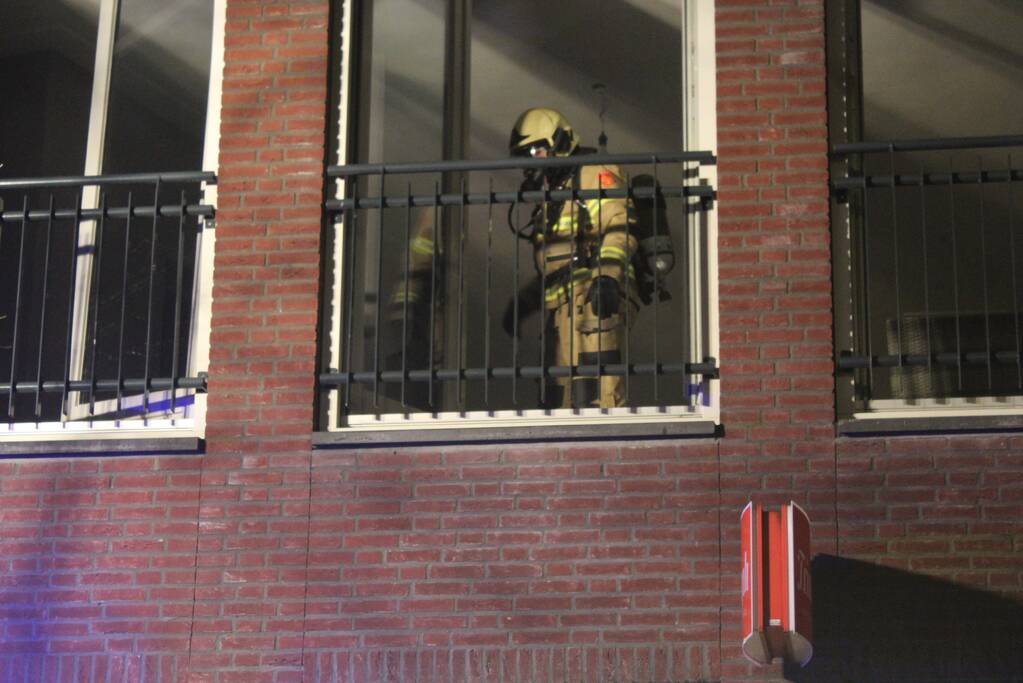 Brand door bouwlamp in appartement