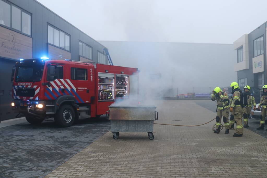 Afvalcontainer vat vlam