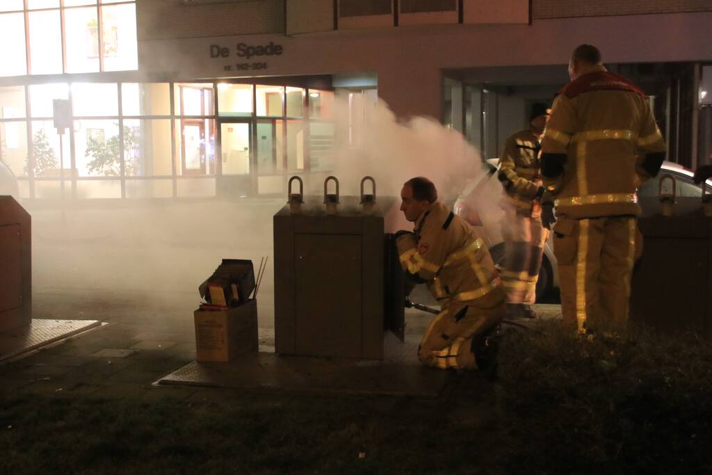 Brand ontstaan in ondergrondse container