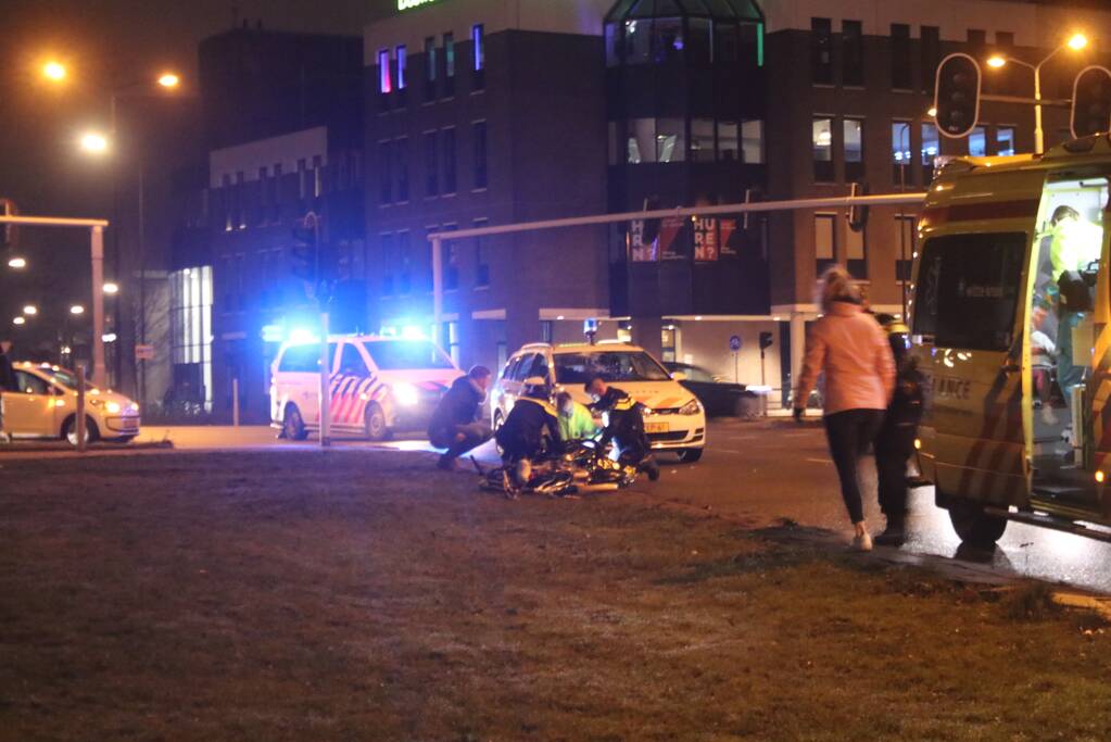 Fietsers aangereden door politieauto