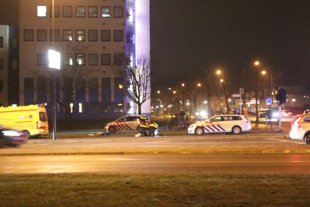 Fietsers aangereden door politieauto