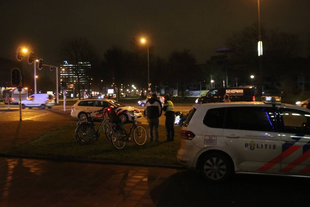 Fietsers aangereden door politieauto