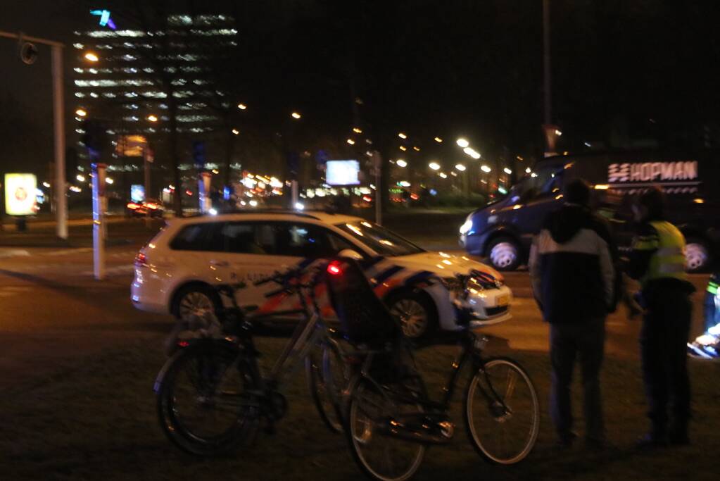Fietsers aangereden door politieauto