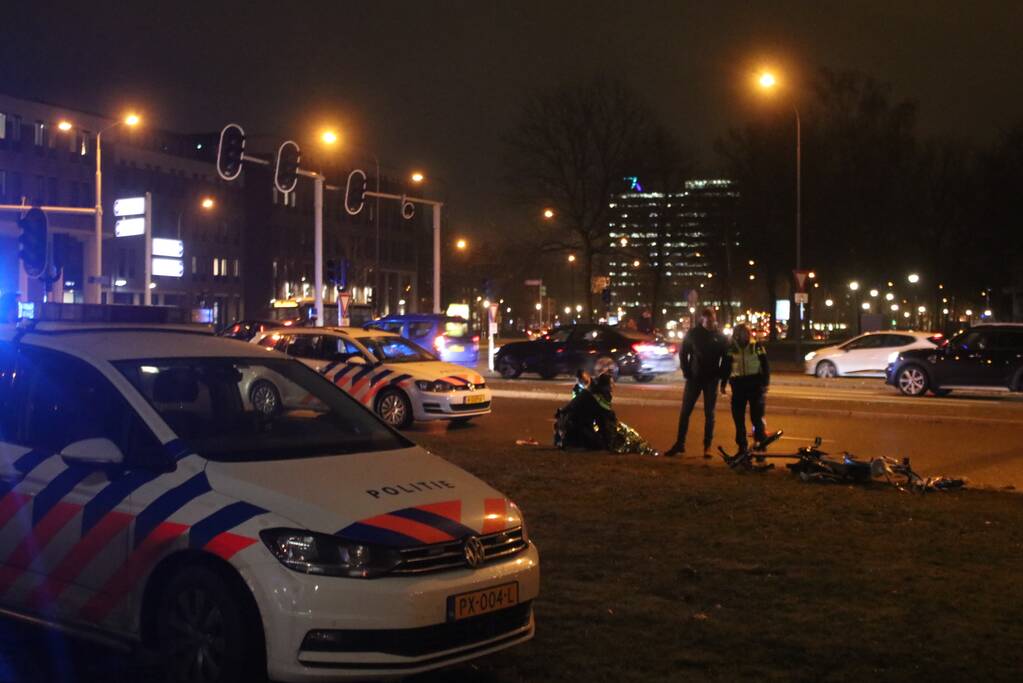 Fietsers aangereden door politieauto