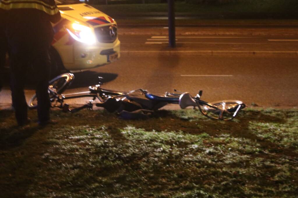 Fietsers aangereden door politieauto