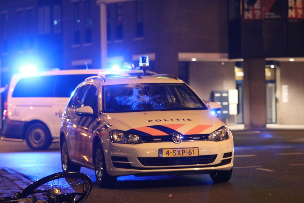 Fietsers aangereden door politieauto