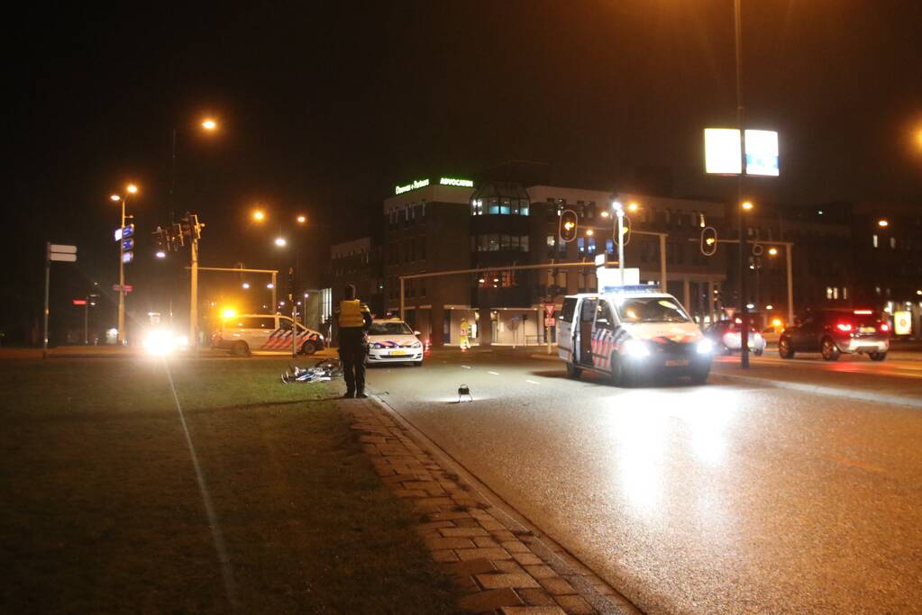 Fietsers aangereden door politieauto