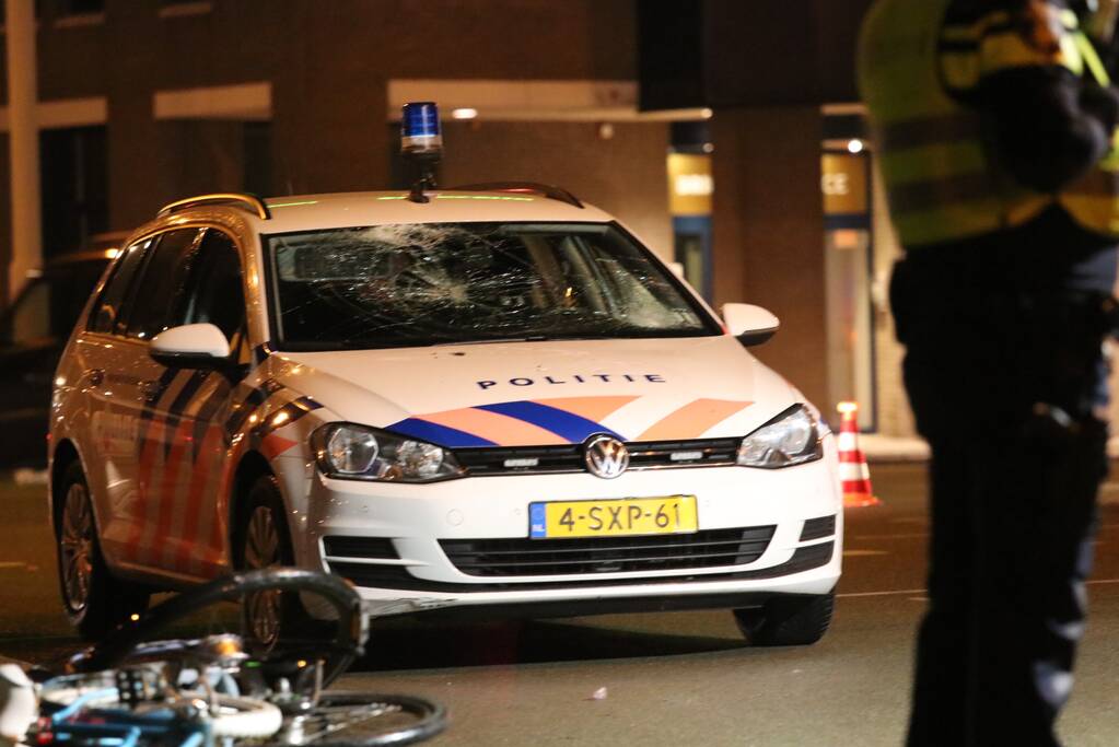 Fietsers aangereden door politieauto