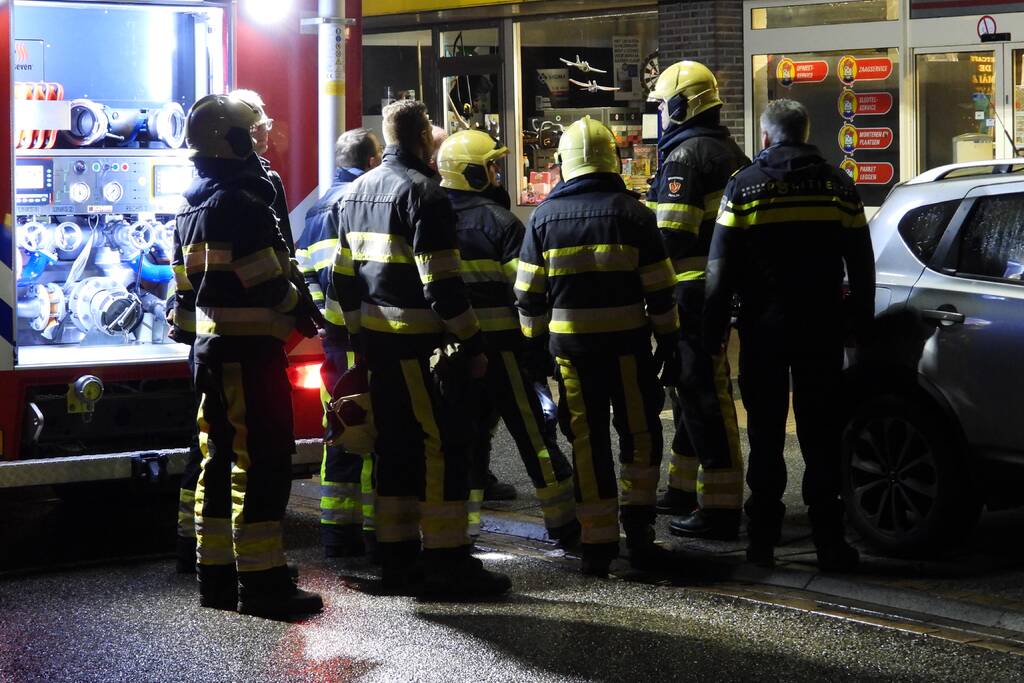 Brand in schoorsteen bovenwoning winkelpand