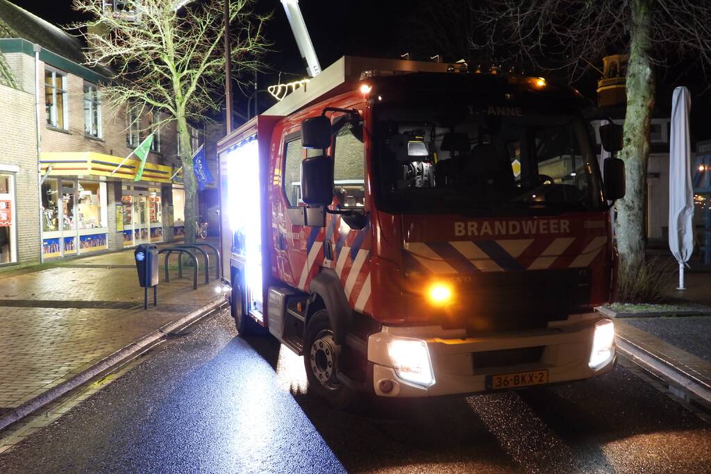 Brand in schoorsteen bovenwoning winkelpand
