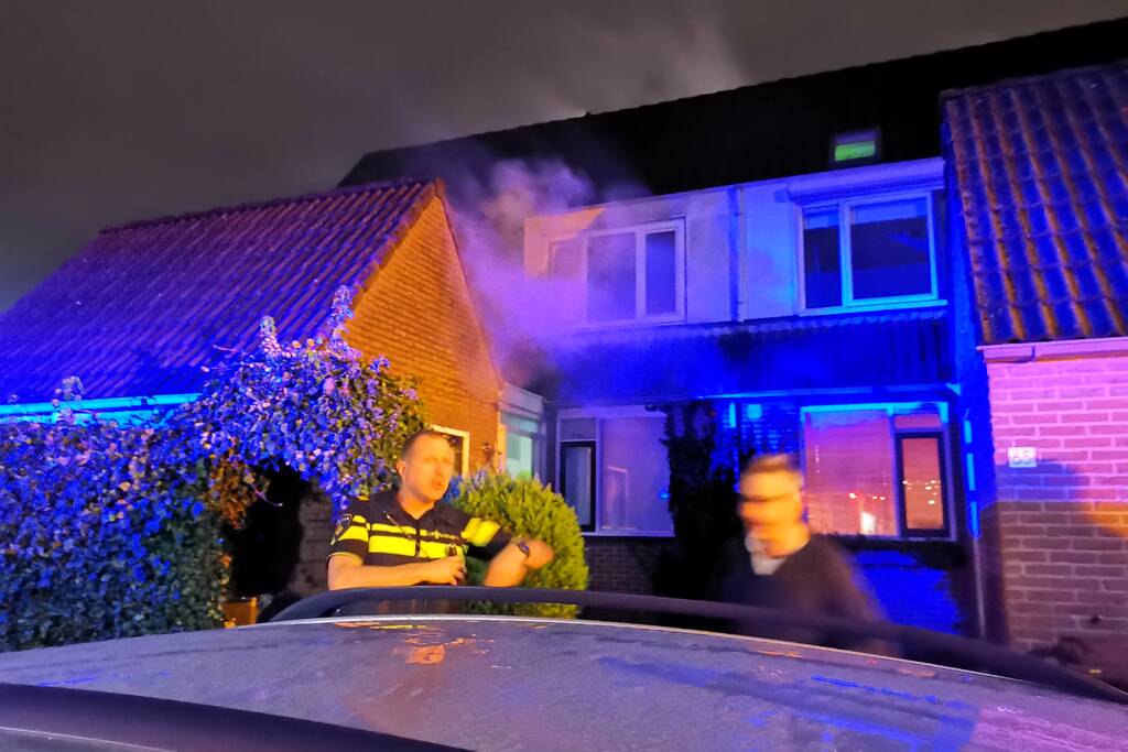 Gewonde en veel rook bij brand in woning
