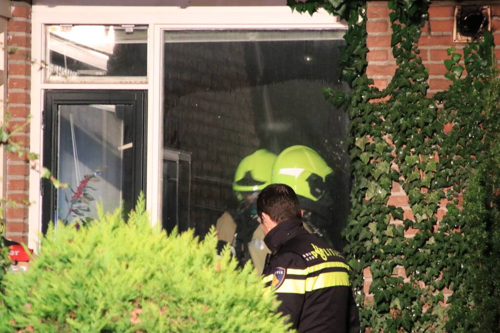 Gewonde en veel rook bij brand in woning