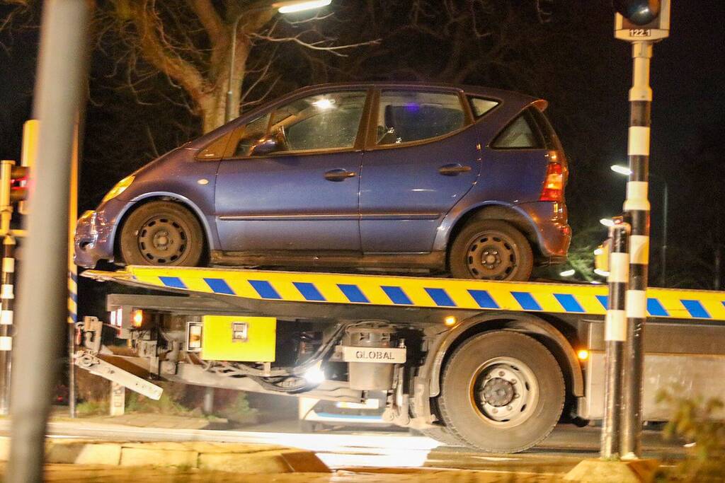 Forse schade na aanrijding op kruising