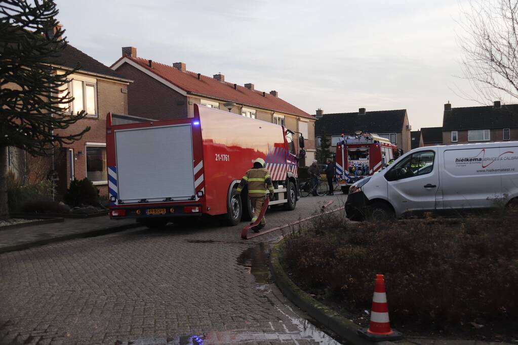 Brand in schuur achter woning